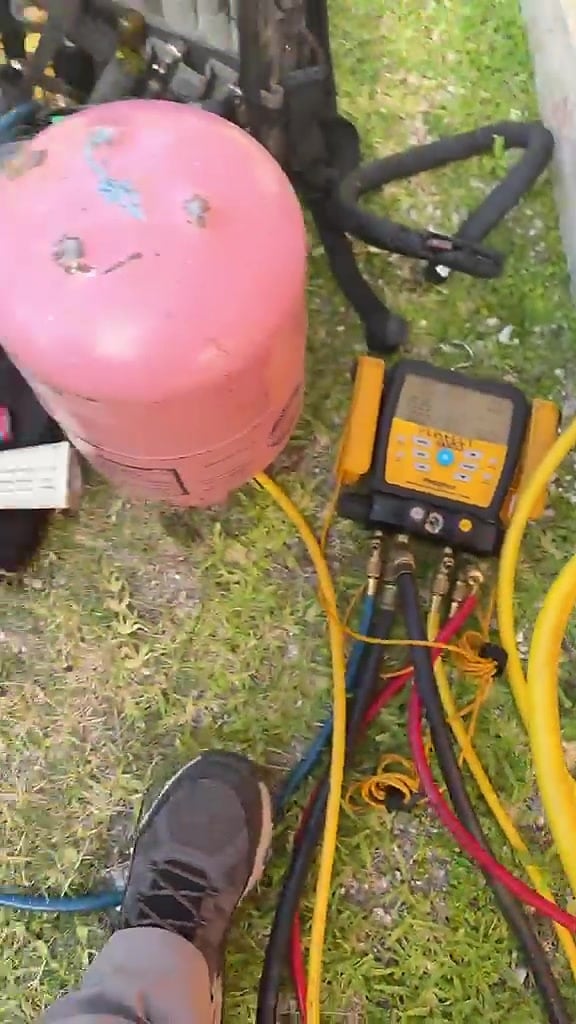 Manifold gauges and refrigerant on site